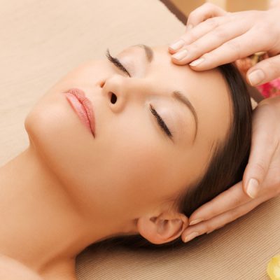 picture of happy beautiful woman in massage salon